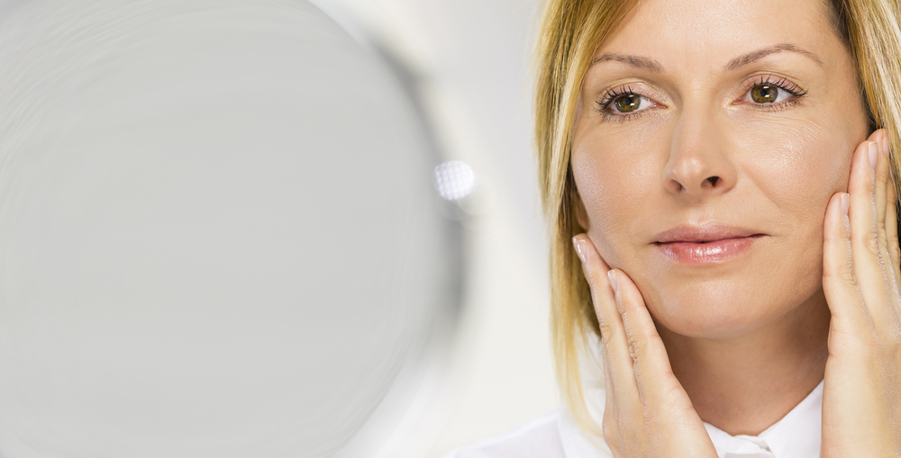 Woman has glowing radiant skin with non-invasive treatments to tackle early signs of aging.